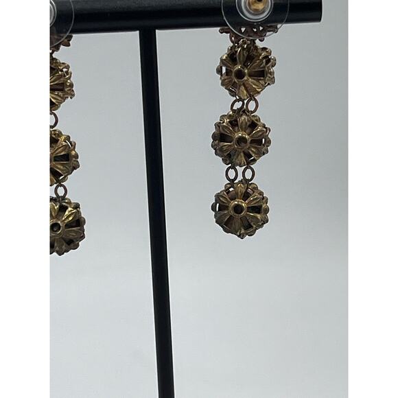 Vintage Gold-Tone Filigree Drop Rhinestone Accents
Statement Dangle Earrings - Picture 10 of 15